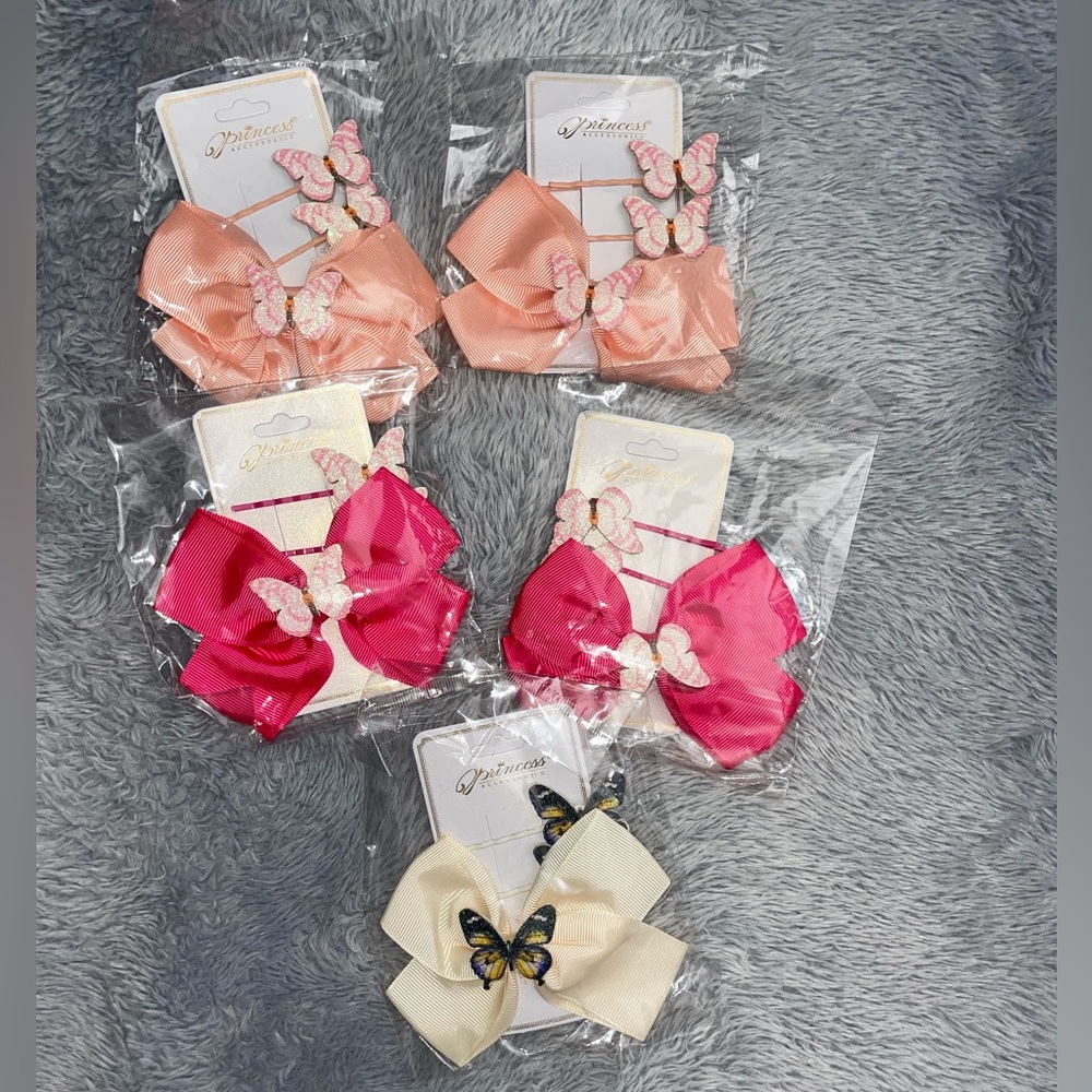 5 Sets of 3 hair clips w/ bows & butterflies in each set all new in packaging